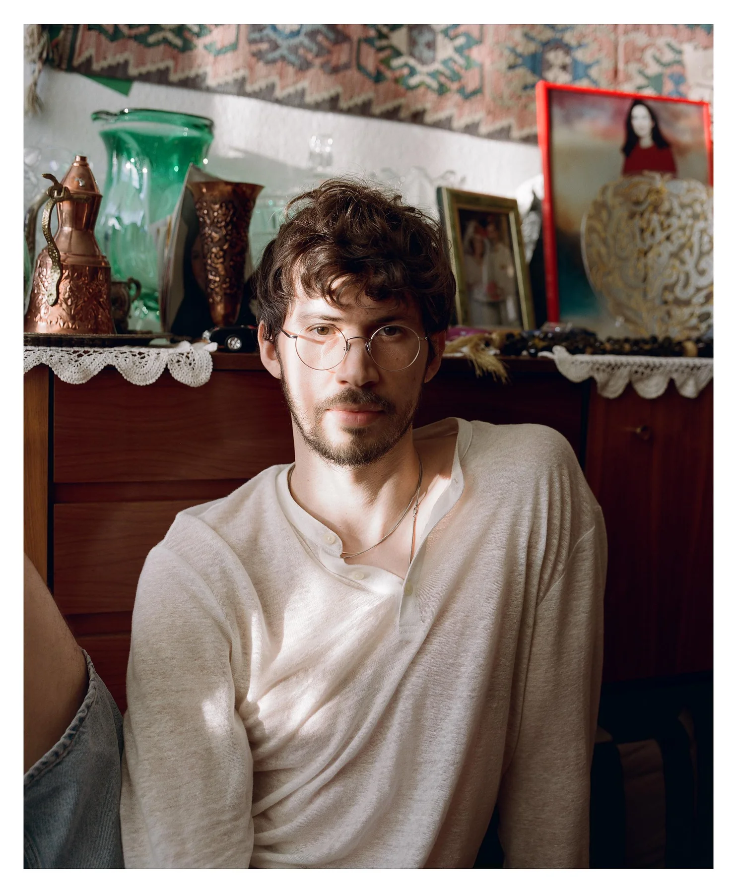 Samet Durgun, seated, photographed at home.